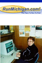 Judy Cutler working hard on RunMichigan.com